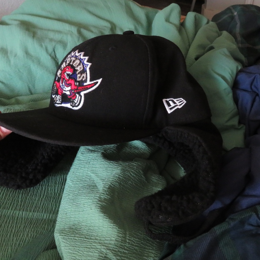 Black HWC NE Raptors winter hat.